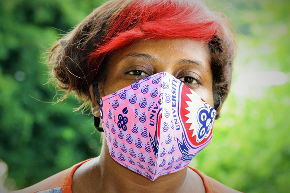 A staff in face mask to shpow as proof