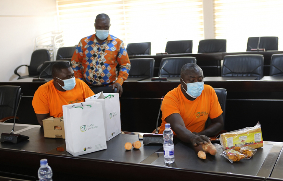 he team from Casa de Ropa displaying some of their products