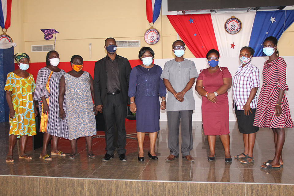 Participants in a group photograph with the facilitators 
