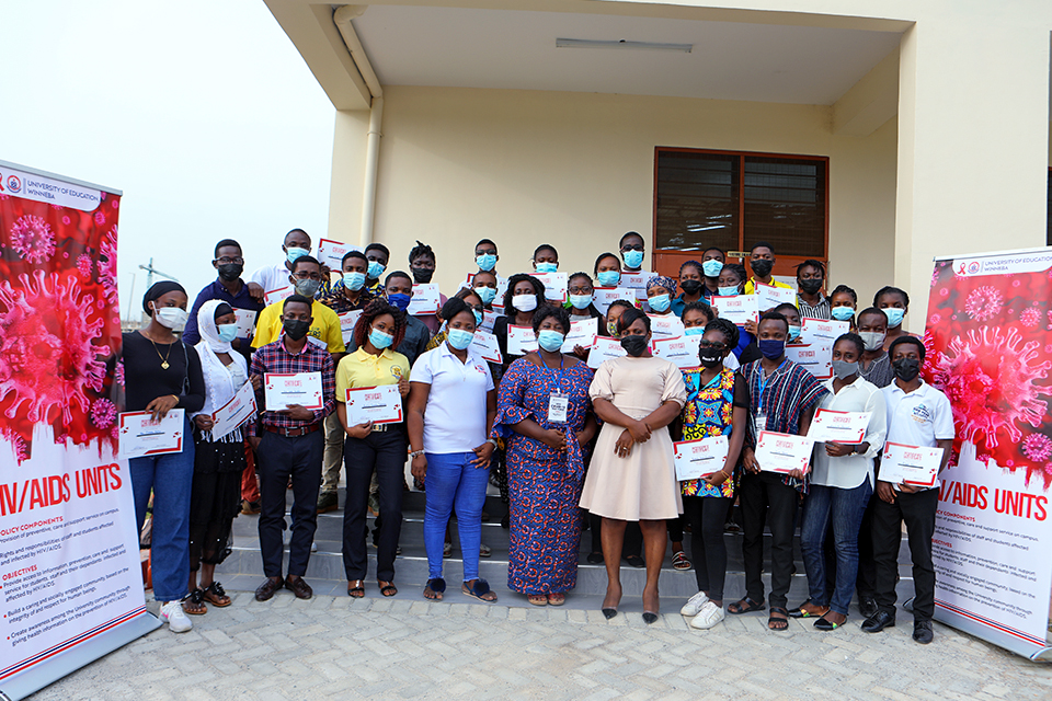 Peer Educators in a group picture with the organisers at Winneba Campus