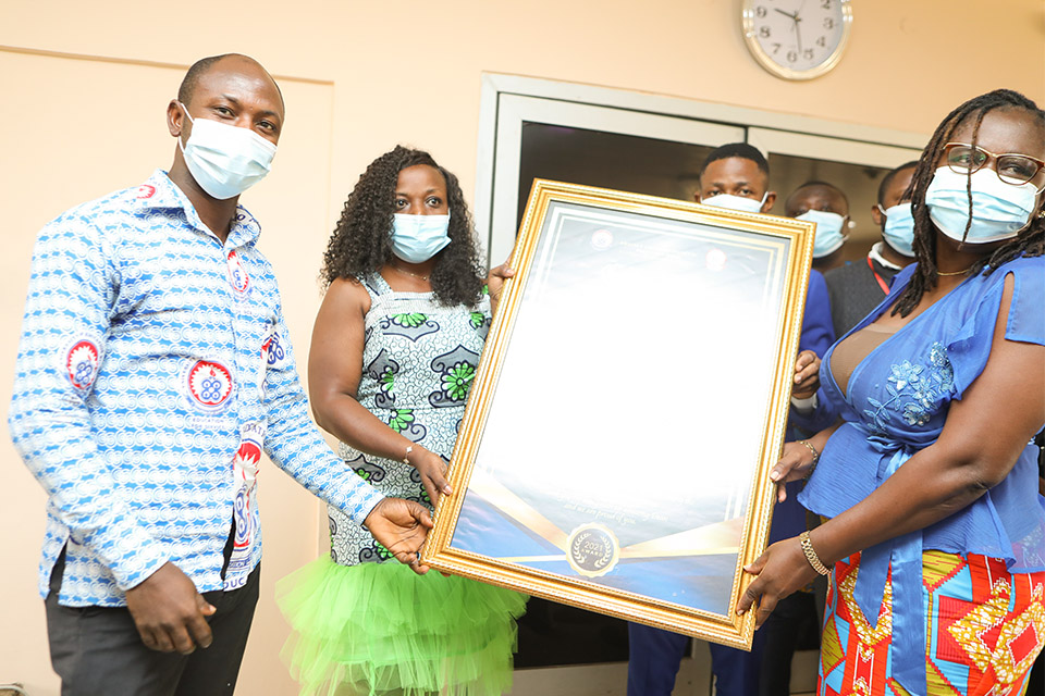 Vice-Dean of Student Affairs, Dr. Juliana Daniels receiving a citation on behalf of the Dean, Student Affairs, UEW, Prof. Ernest Kwasi Amponsah