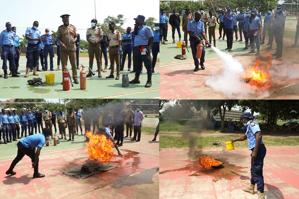 The security personnel having practice hands-on on the safest way to quench fire