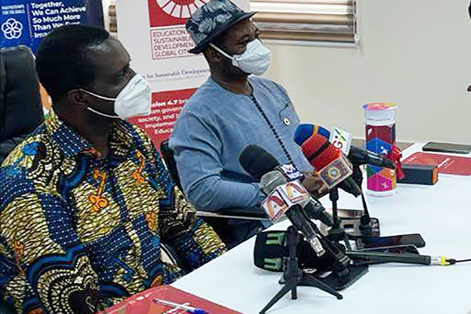 Hon. Dr. Yaw Osei Adutwum (left)