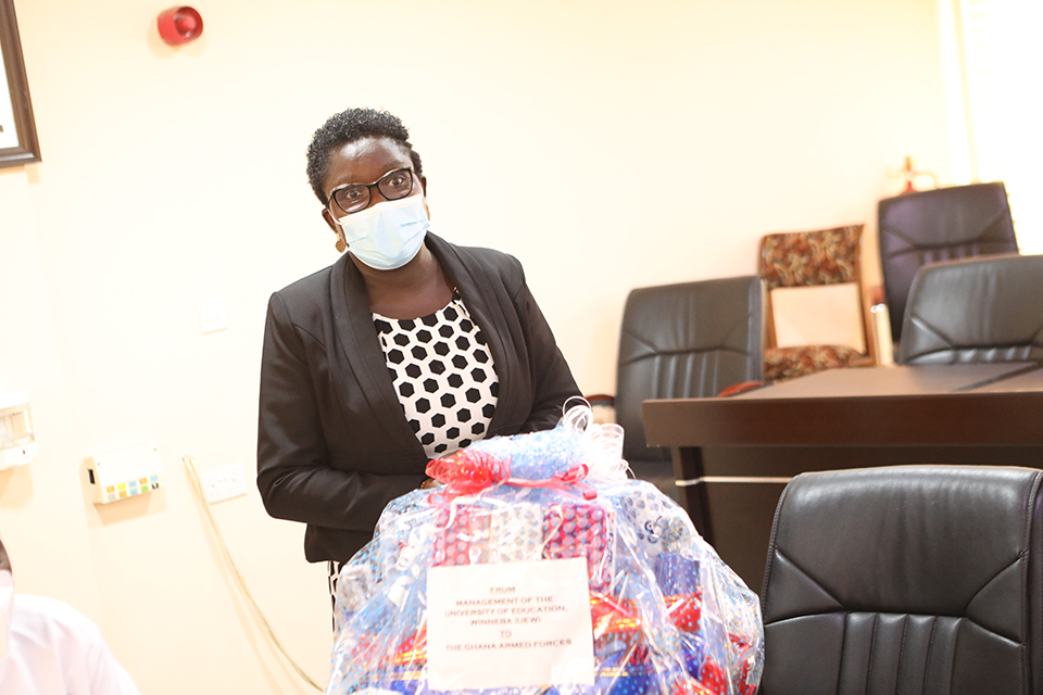 Dr. Obaapanin Oforiwaa presenting the items to GAF on behalf of the University