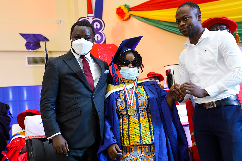 Hon. John Ntim Fordjour (left), with a deafblind student, Ms. Sylvia Abena Peprah who graduated with a Bachelor of Arts in Special Education 