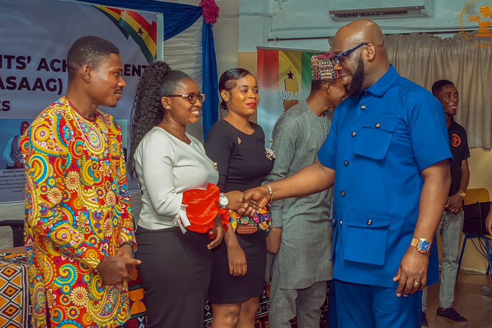 Ms. Abigail Ayamba being congratulated on her appointment 