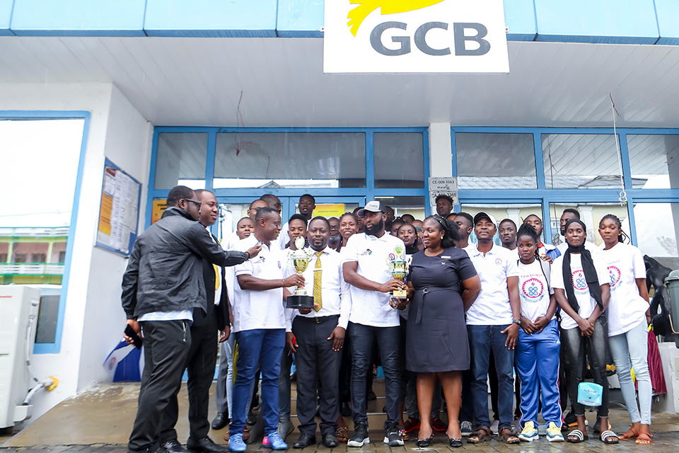 The contingents in a group photograph with the staff of their sponsors GCB Bank PLC