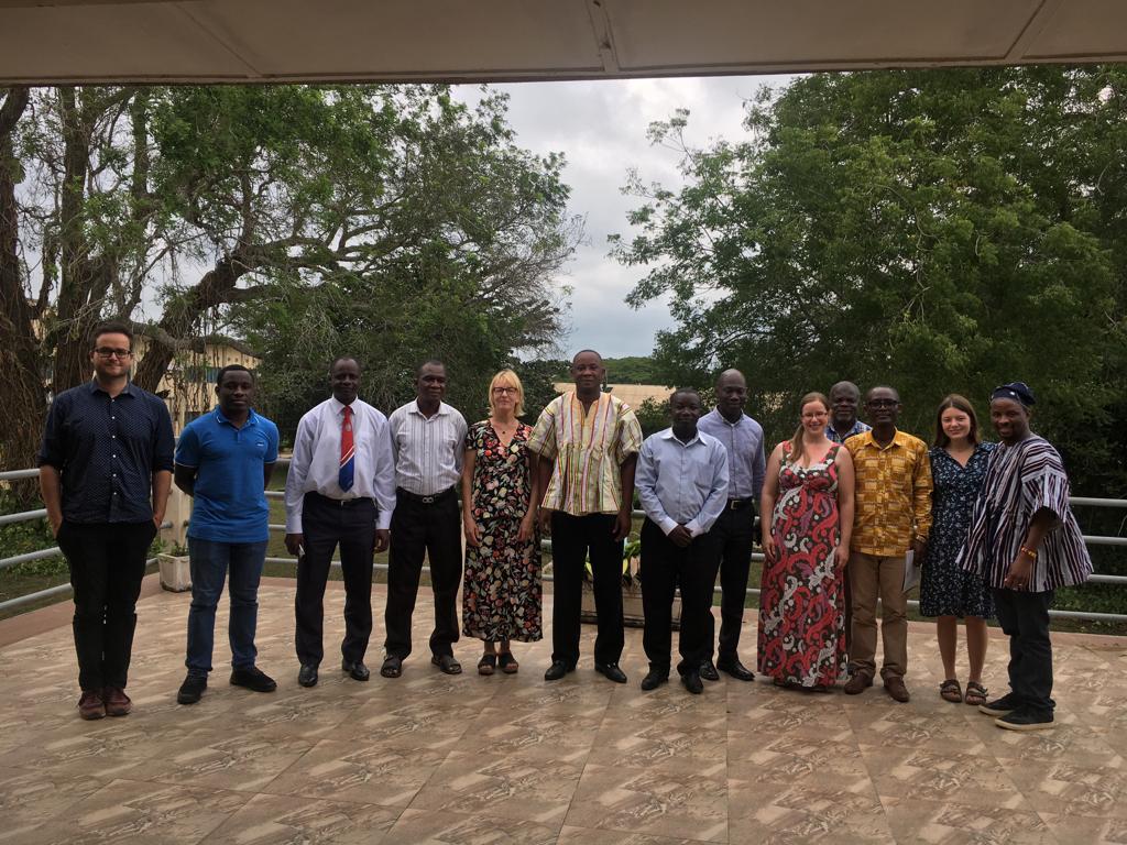 Staff of UEW in a group photography with the project team