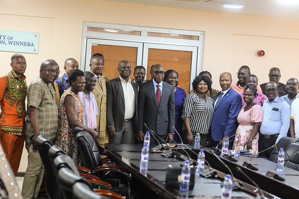 Management of UEW and union leaders in a group photograph after the meeting