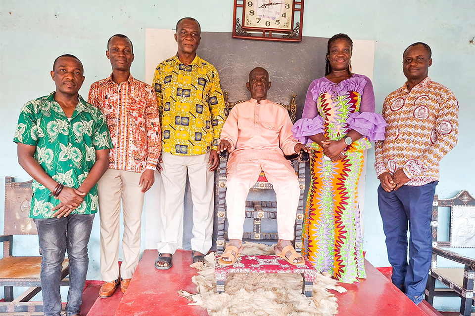 Prof. (Mrs.) Rebecca Atchoi Akpanglo-Nartey and some Management members of Ajumako with Okokudurfo Ogyeabour Kwamena Hammah Ababio II.