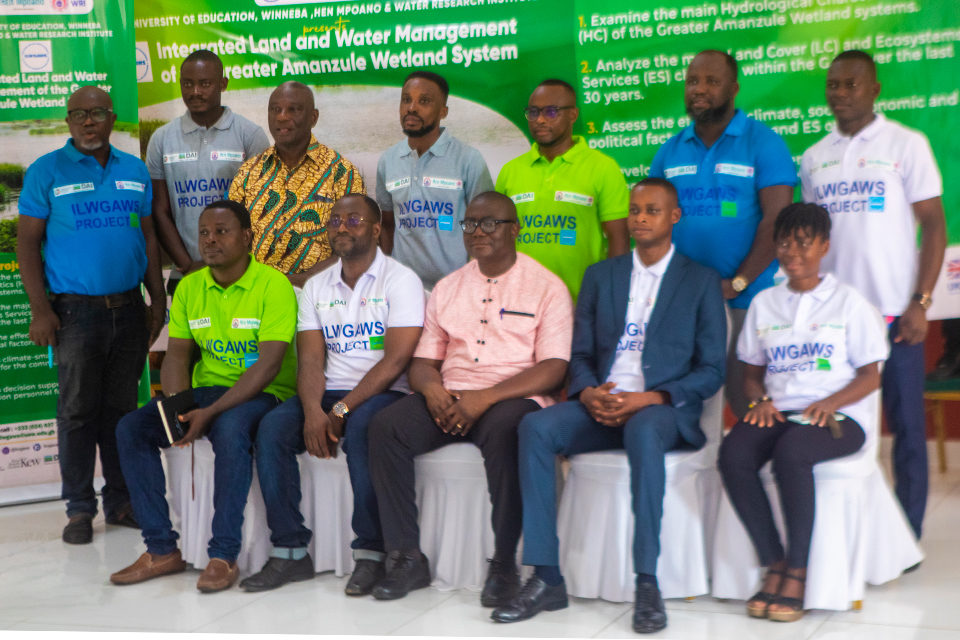 The project team members in a pose after the launch