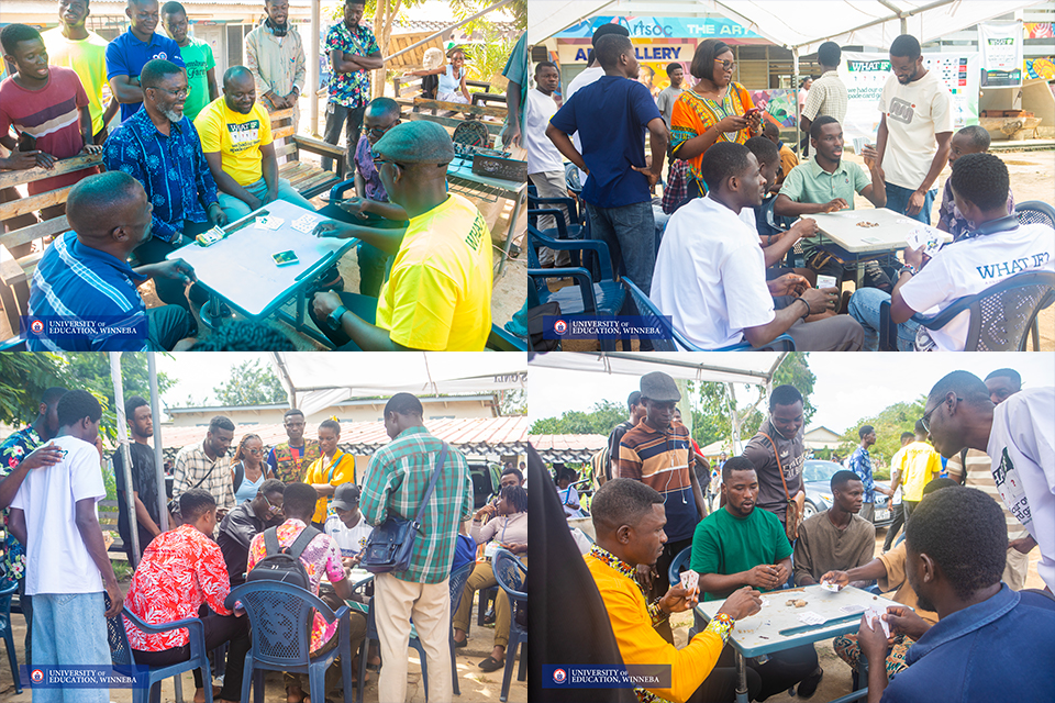 A photo showing faculty members and students playing with the unveiled cards