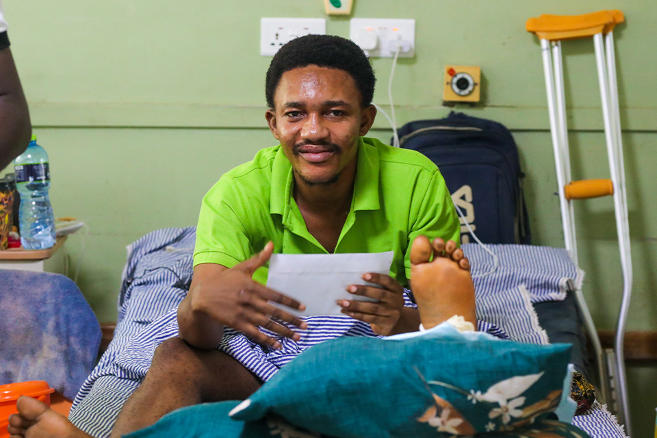 Mr. Emmanuel Akwasi on his sickbed after receiving the cash donation