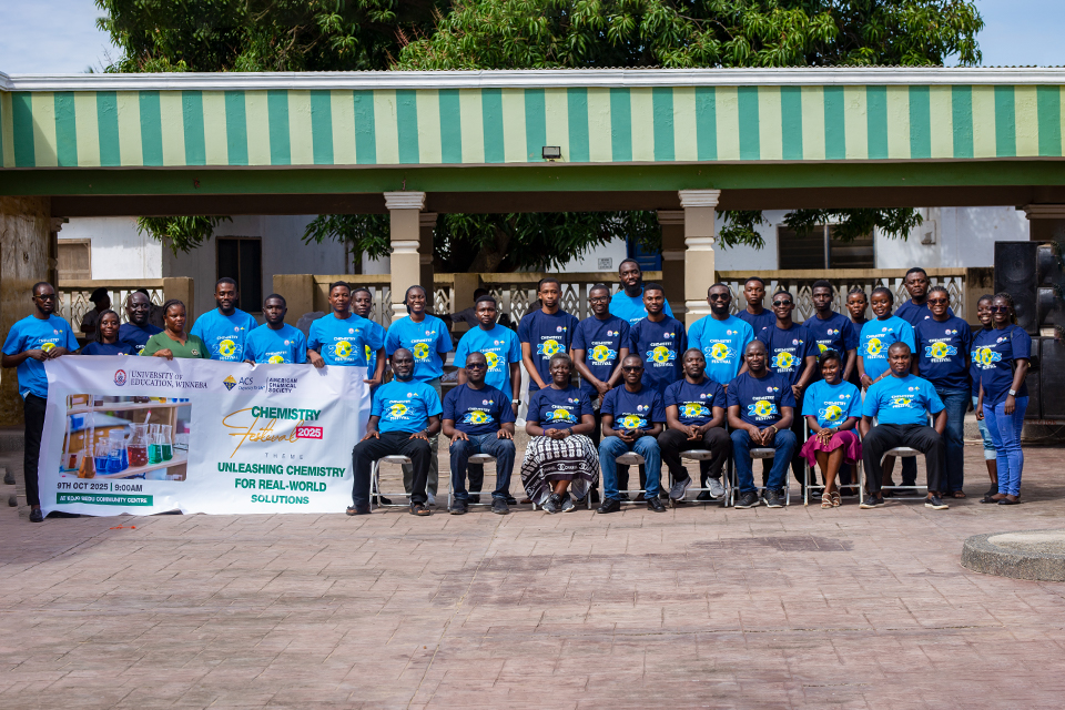 UEW faculty members, volunteers, and JHS teachers pose together after the event.