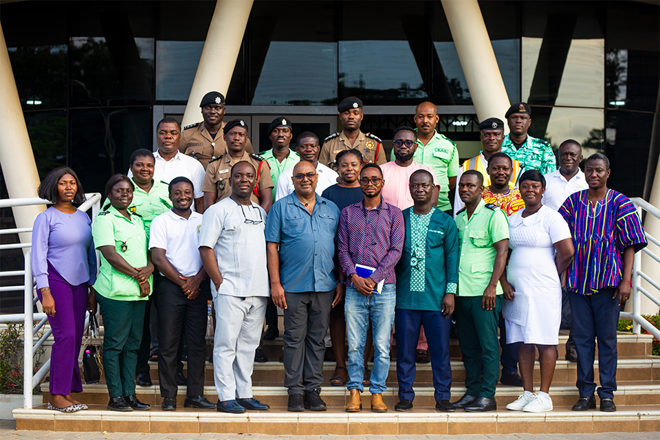 Participants pose for a group photograph after the first day