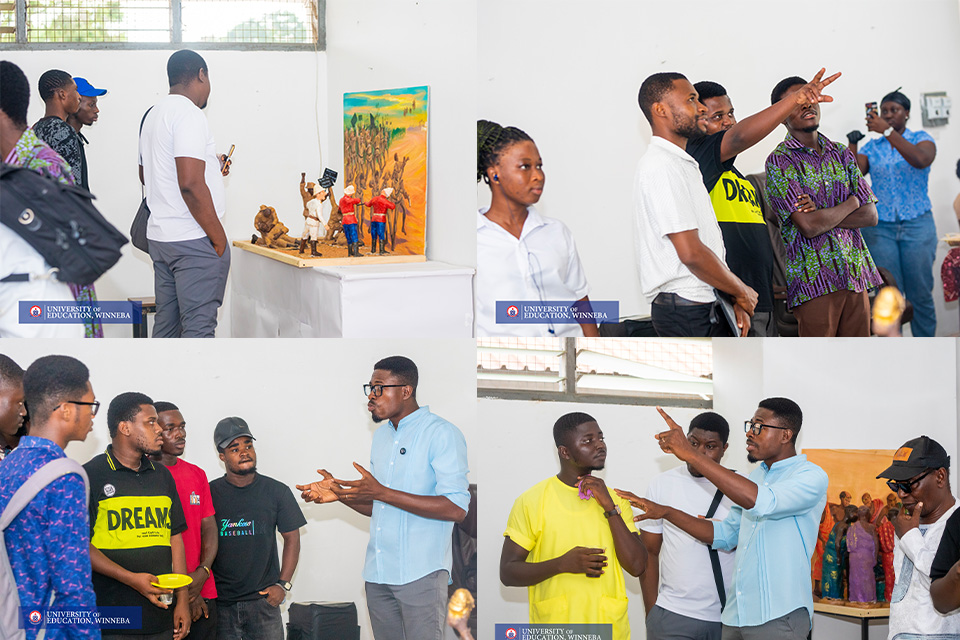 An image depicting art-inclined students and staff viewing the exhibited artwork