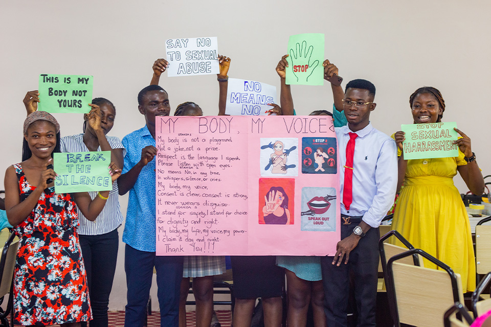 Group members sharing the poem they composed with their colleagues