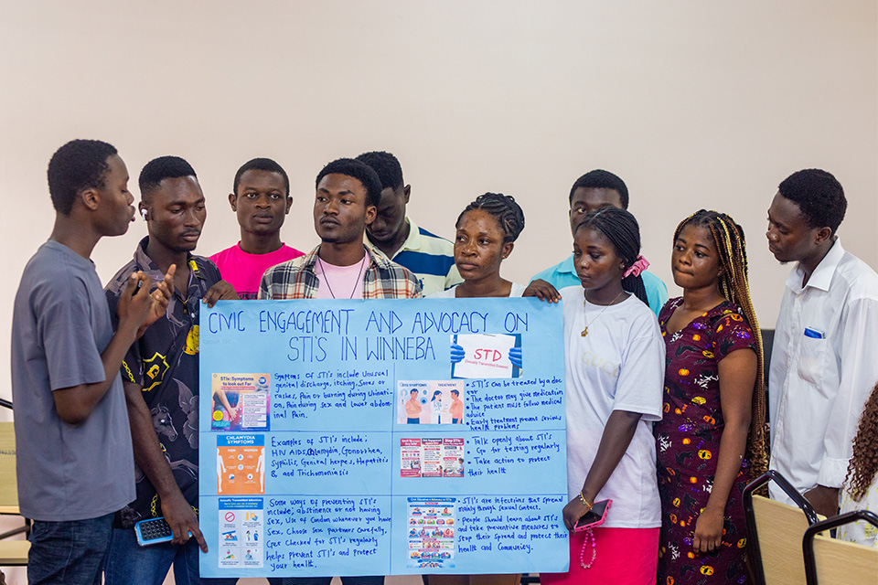 Isaac Frimpong (left) making a presentation on behalf of his group 