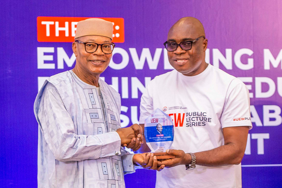 Prof. Stephen Jobson Mitchual (right) presenting a plaque to the keynote speaker 