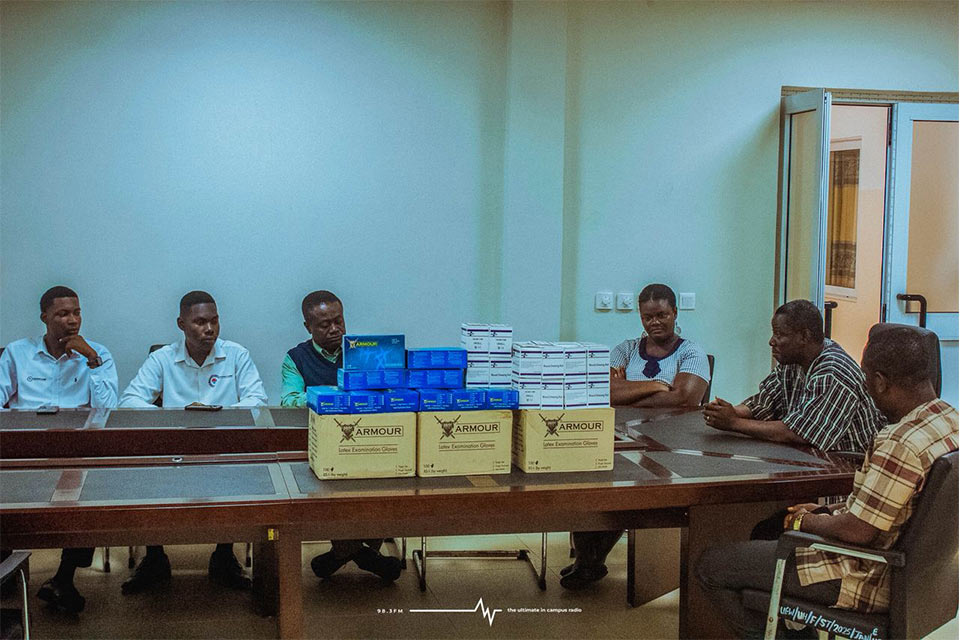 Dr. John Kanyiri Yamba (second from the right) addressing the donor and his delegation