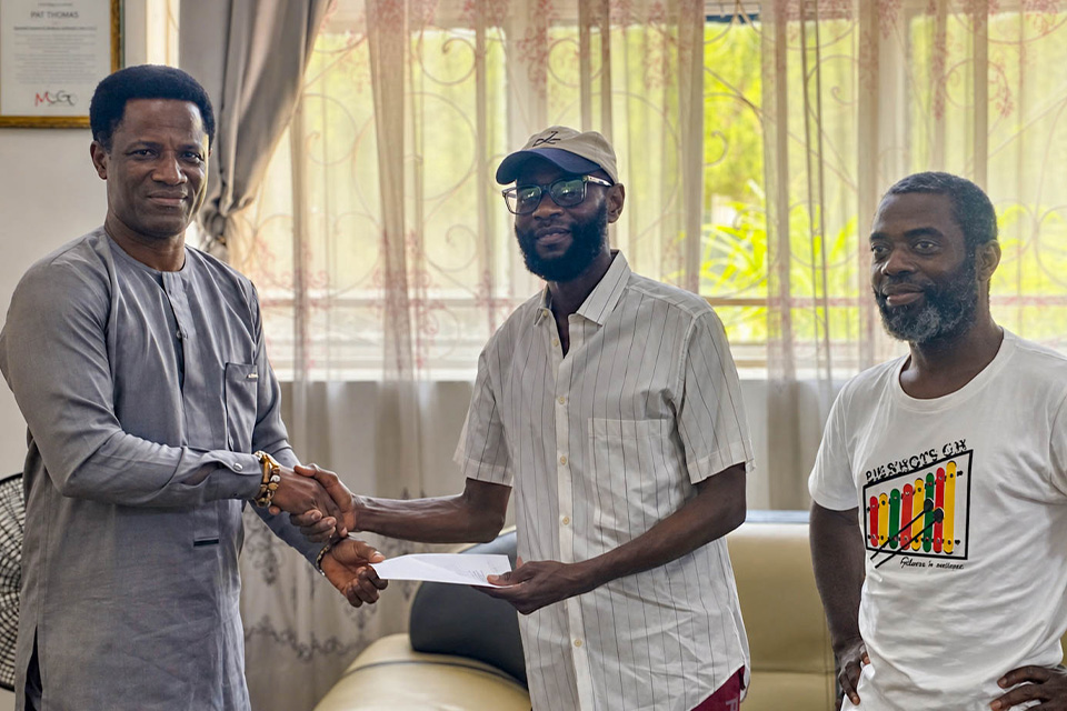 Legendary Pat Thomas receiving the official invitation from the Department