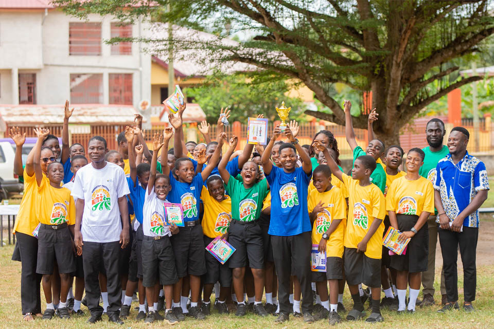 Maryland Montessori Learning Centre celebrate their victory with the trophy